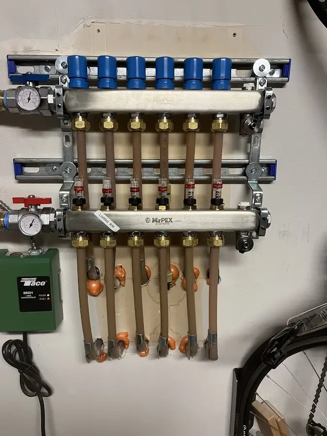 Plumber performing Gas Line Installation at a residential property in San Mateo